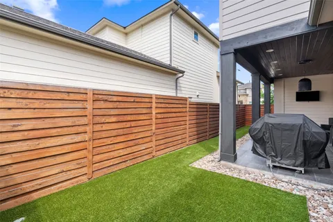a view of a backyard with plants