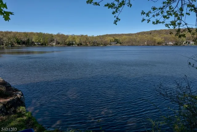 a view of mountain with lake view