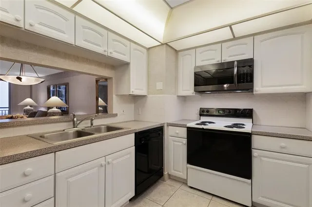 a view of a hallway with shelves