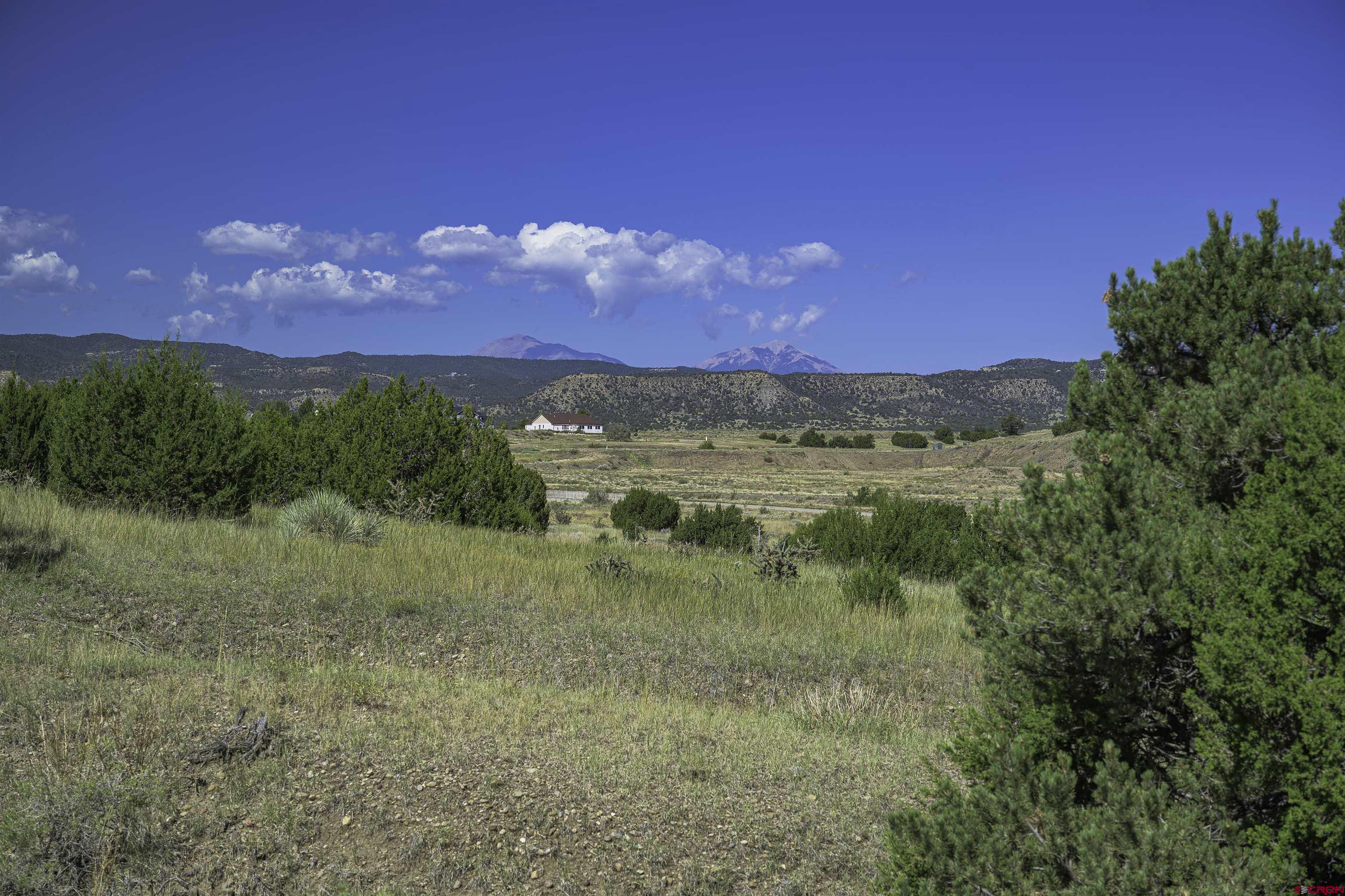 37250 Kunzite Road Trinidad, CO 81082 - Photo 3 of 33 a view of a lake with mountains in the background