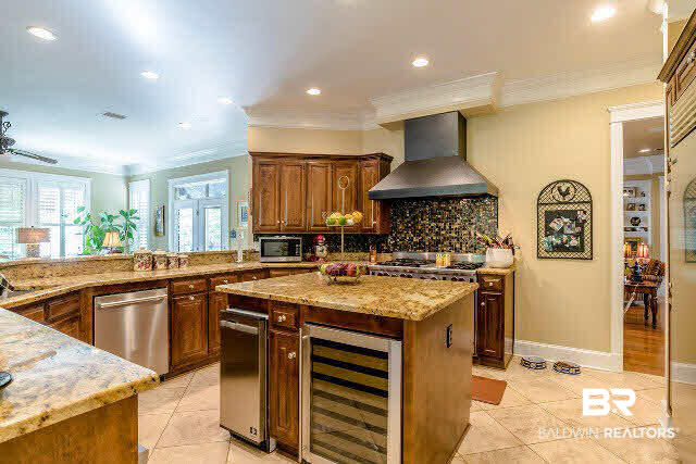 33509 Alder Circle Daphne, AL 36527 - Photo 7 of 28 Oversized Island, Free Standing Ice Maker, and Beverage Cooler makes Baking, Cooking and Entertaining a Breeze.