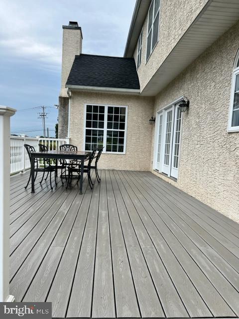 271 West Branch Road Oxford, PA 19363 - Photo 3 of 42 a view of a roof deck with table and chairs with wooden floor and fence