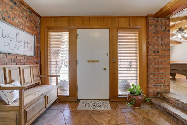 a view of an entryway with a hardwood