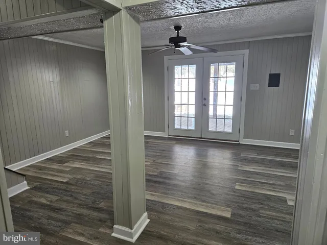 a view of a livingroom with wooden floor