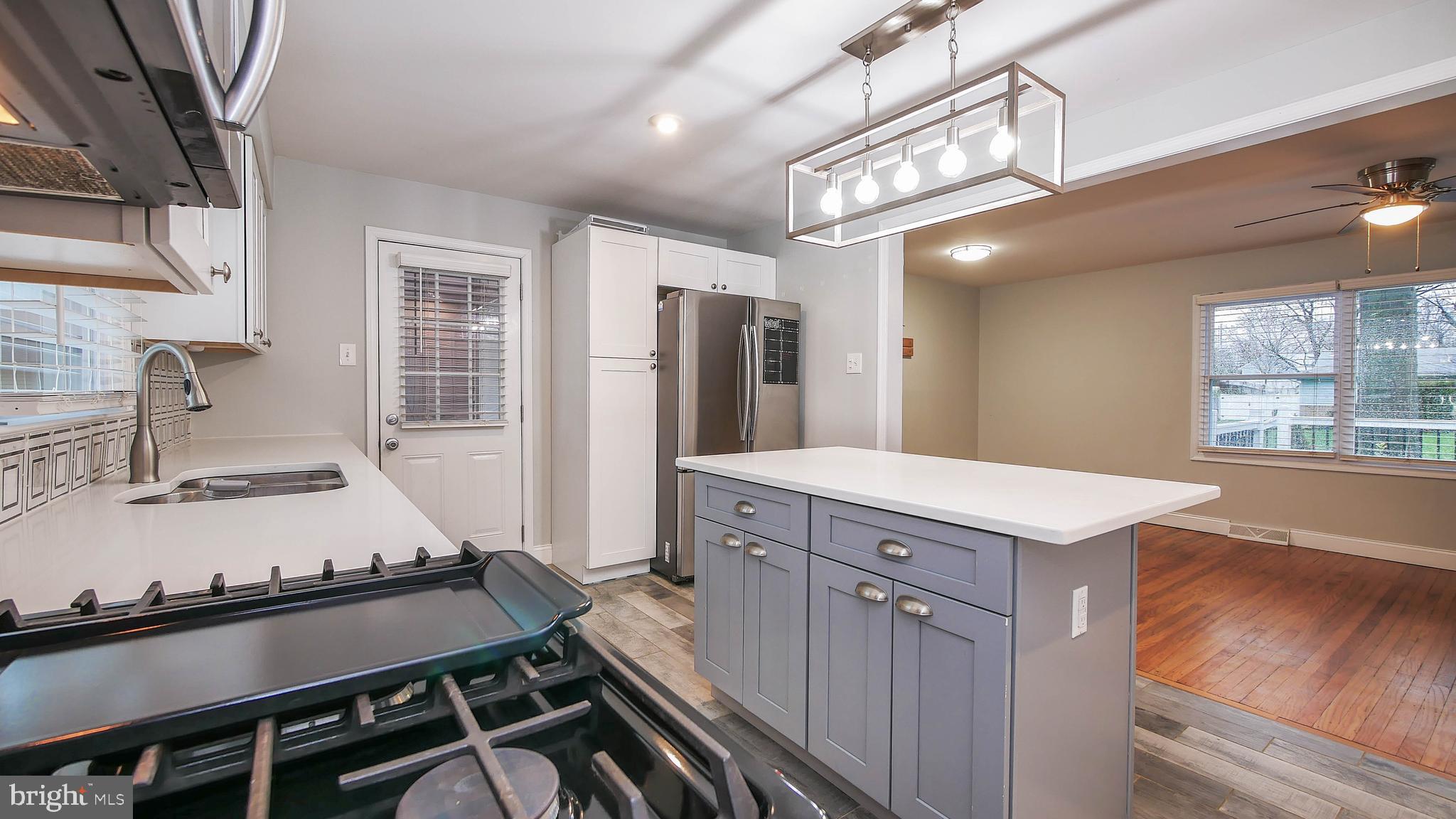 2 Clement Drive Somerdale, NJ 08083 - Photo 15 of 22 a kitchen with a sink appliances and cabinets