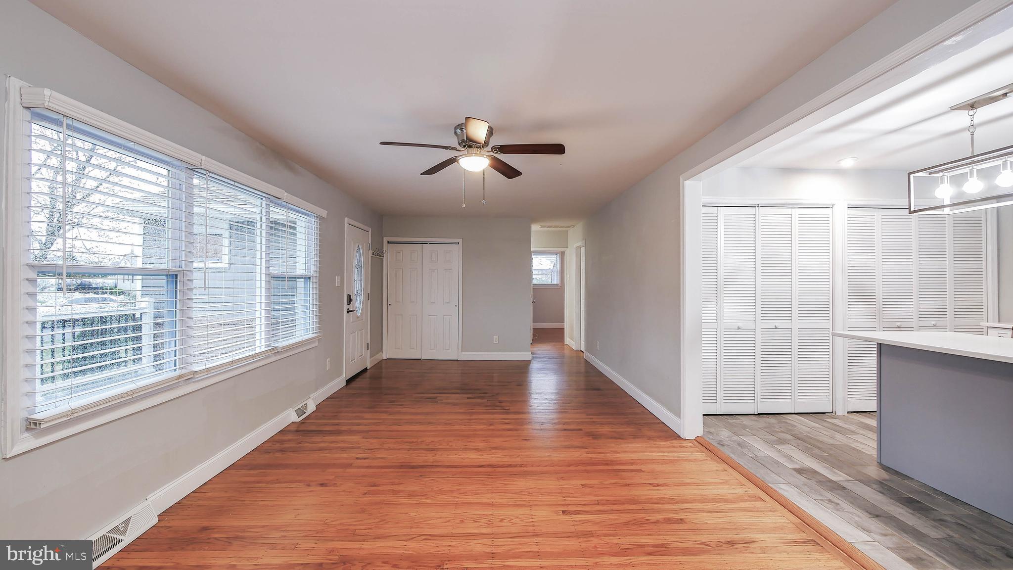 2 Clement Drive Somerdale, NJ 08083 - Photo 20 of 22 a view of an empty room with a window and wooden floor