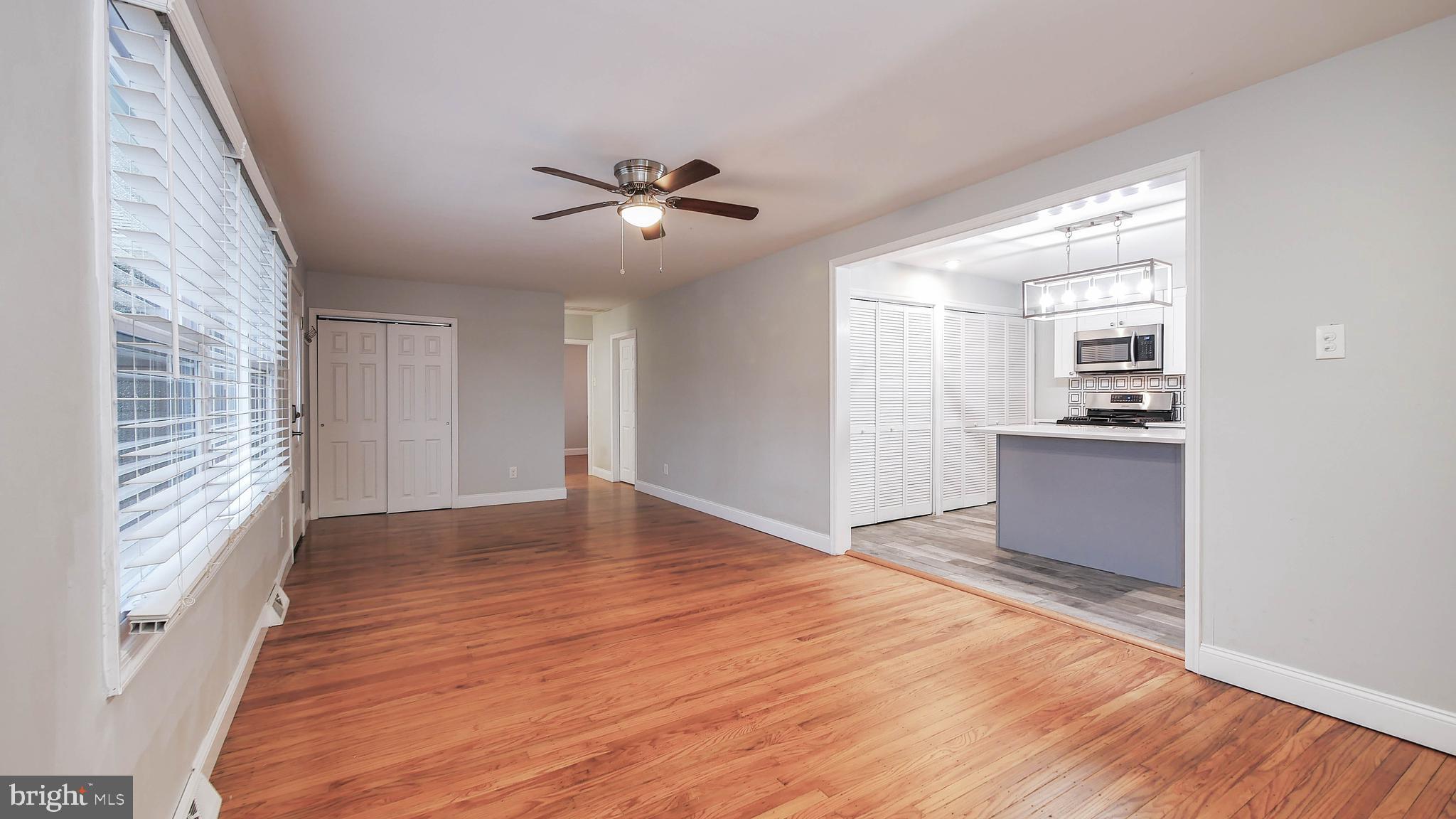 2 Clement Drive Somerdale, NJ 08083 - Photo 22 of 22 a view of empty room with wooden floor and fan