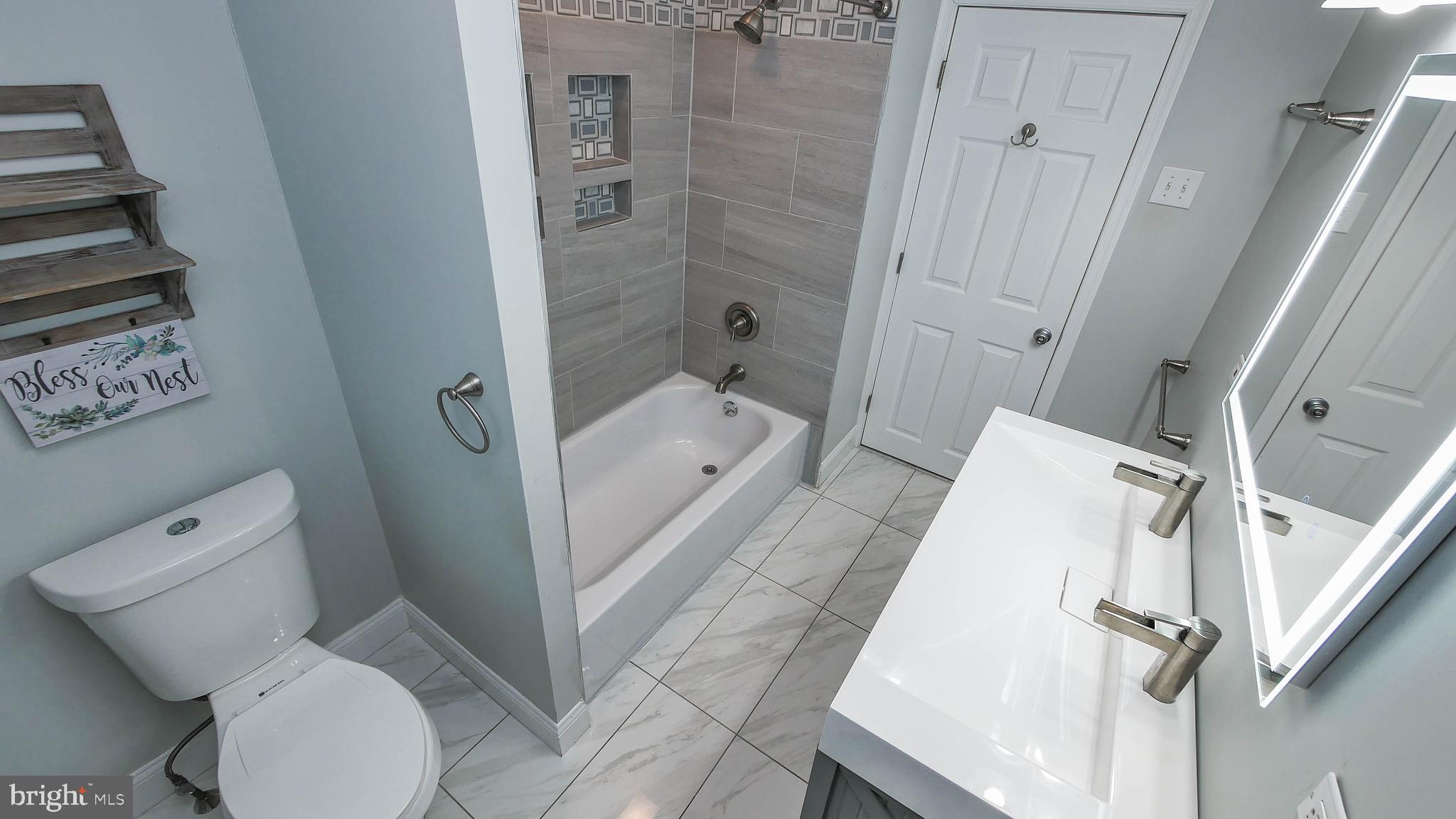 2 Clement Drive Somerdale, NJ 08083 - Photo 8 of 22 a bathroom with a toilet and a shower