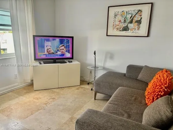 a living room with furniture and a couch