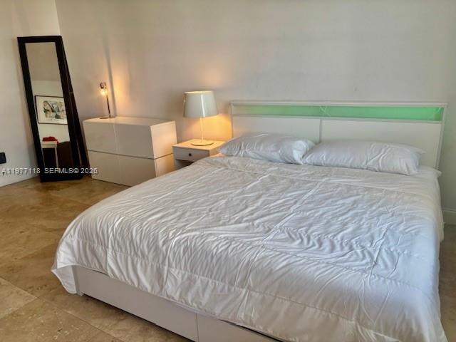 100 Lincoln Road, Unit 531 Miami Beach, FL 33139 - Photo 4 of 31 a bedroom with a bed and a mirror