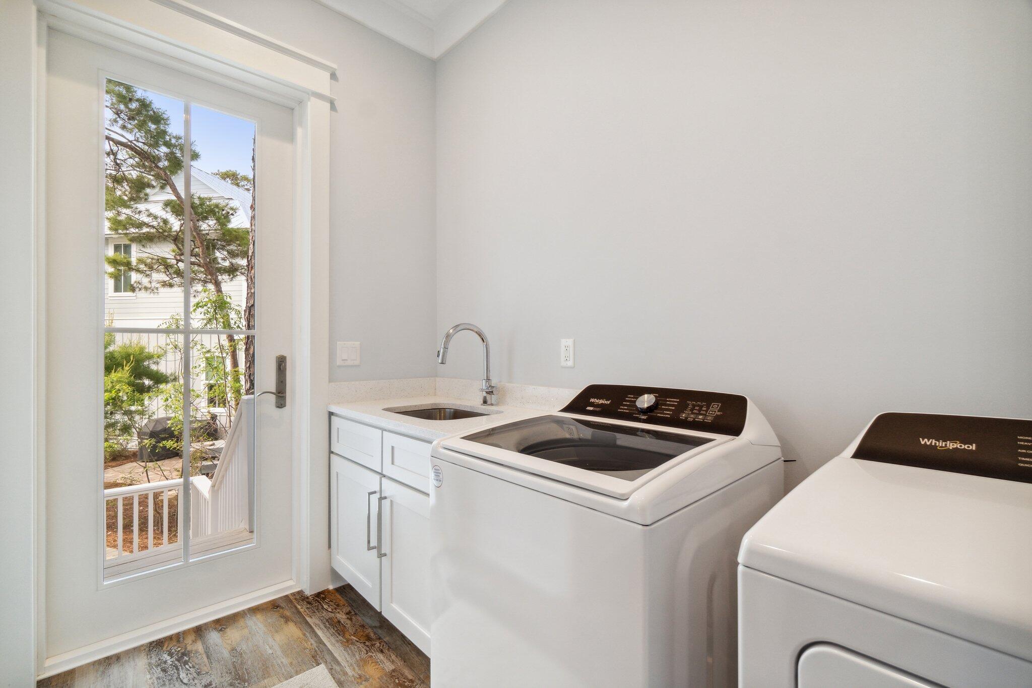 308 Matt's Way Santa Rosa Beach, FL 32459 - Photo 13 of 50 a utility room with dryer and washer