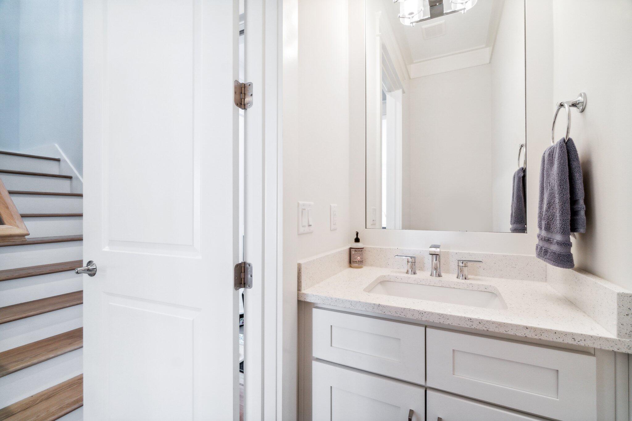 308 Matt's Way Santa Rosa Beach, FL 32459 - Photo 17 of 50 a bathroom with a sink and a mirror