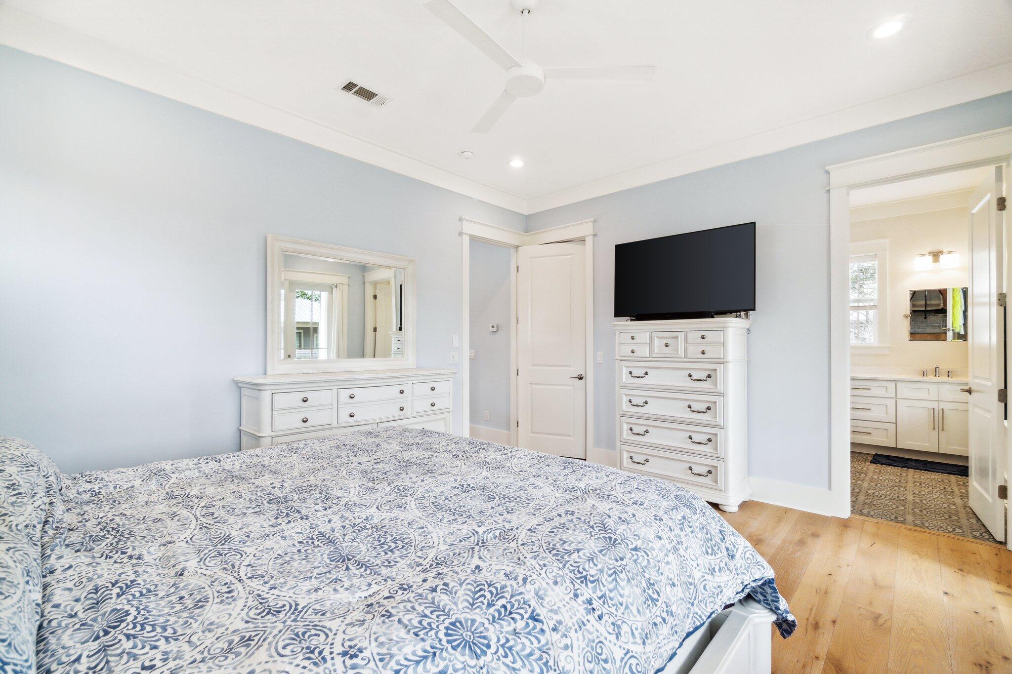 308 Matt's Way Santa Rosa Beach, FL 32459 - Photo 20 of 50 a bedroom with a bed and a flat screen tv