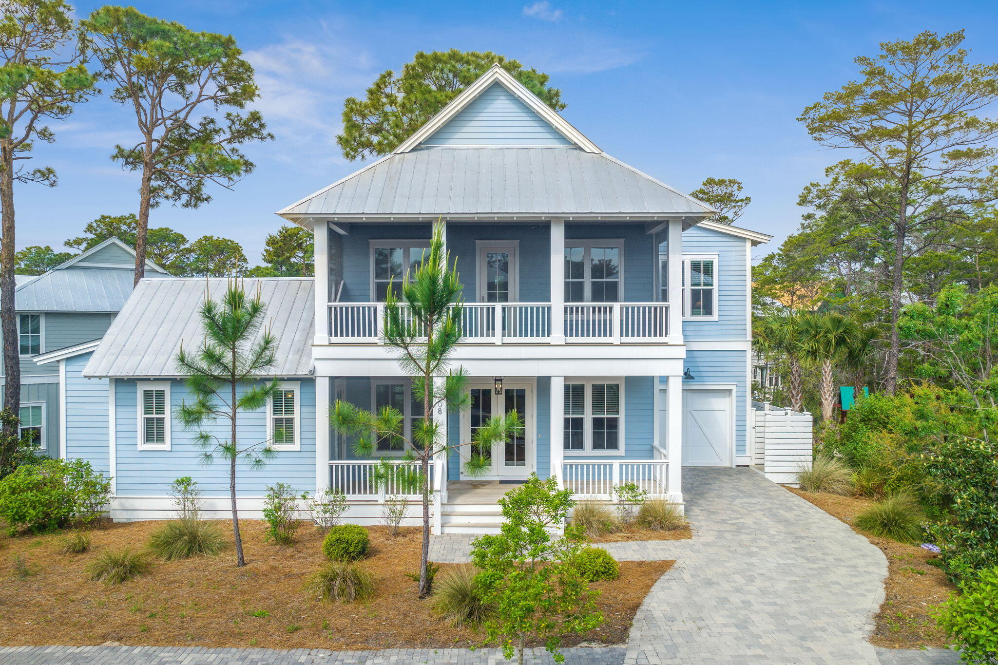 308 Matt's Way Santa Rosa Beach, FL 32459 - Photo 3 of 50 a front view of a house with garden