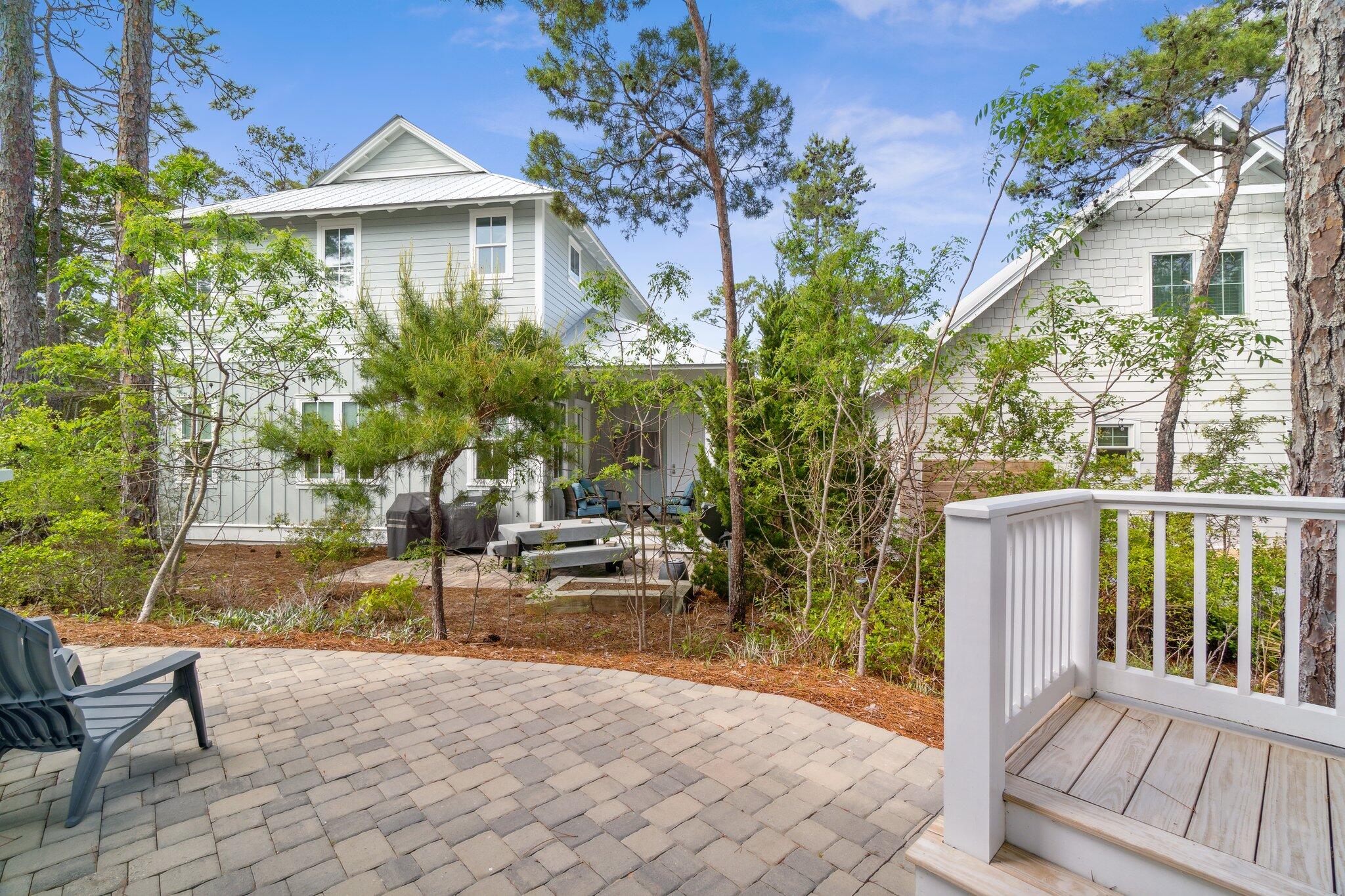 308 Matt's Way Santa Rosa Beach, FL 32459 - Photo 31 of 50 a view of a house with backyard and sitting area