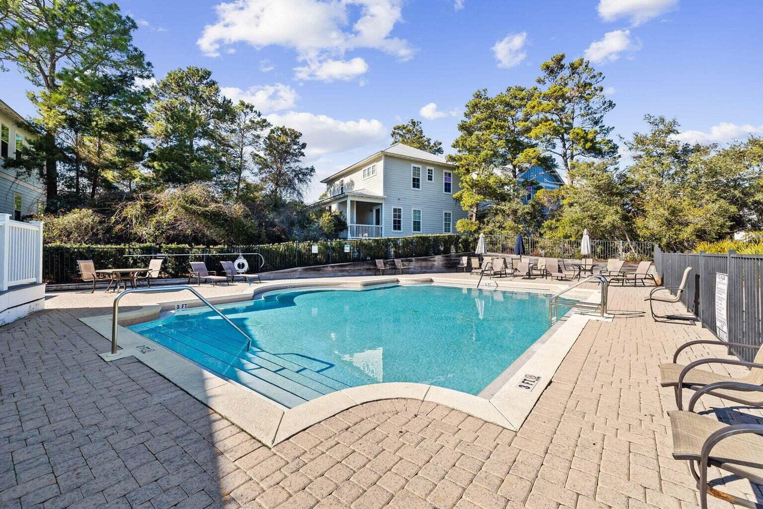 308 Matt's Way Santa Rosa Beach, FL 32459 - Photo 46 of 50 a view of a swimming pool with chairs