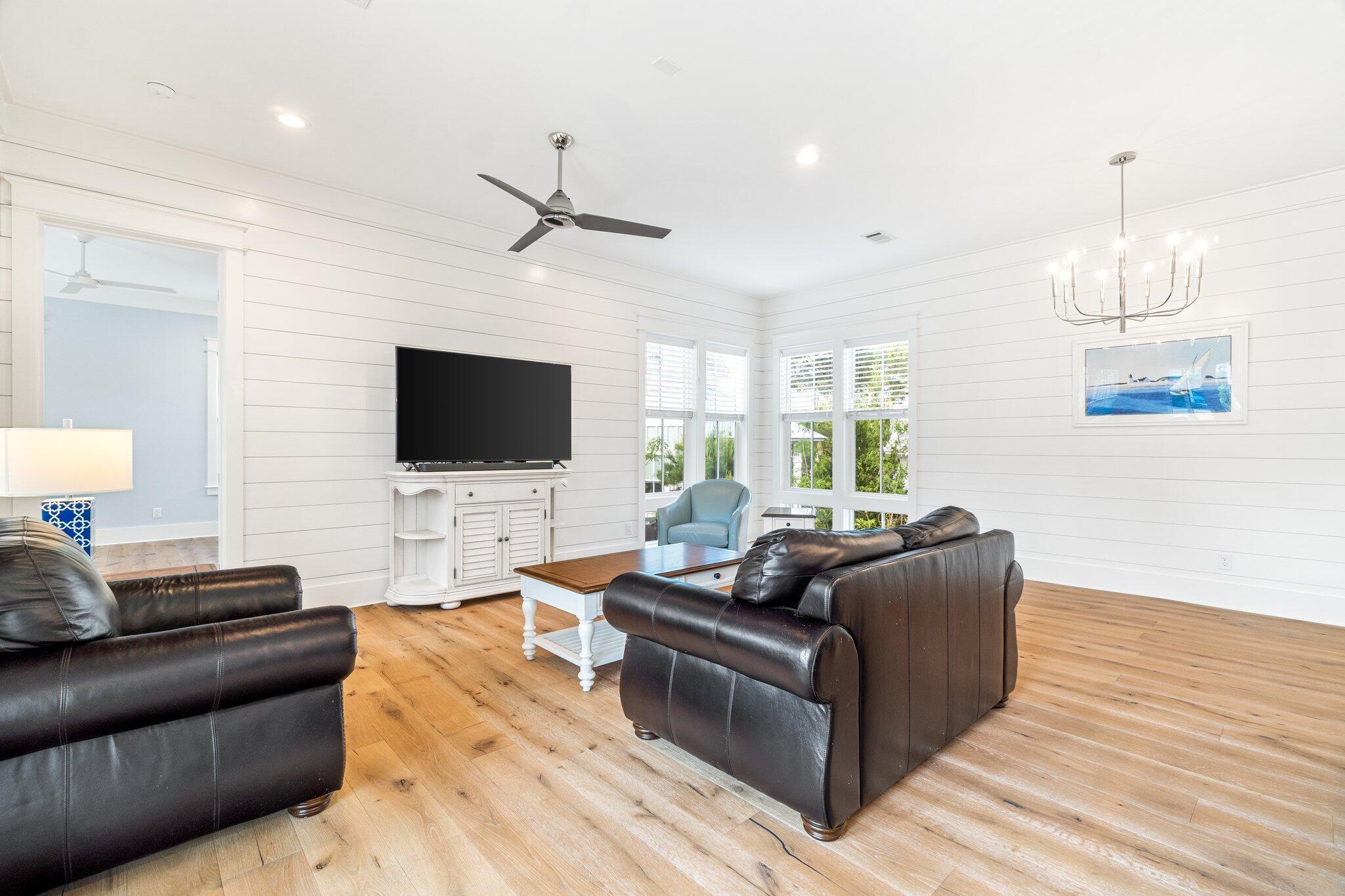 308 Matt's Way Santa Rosa Beach, FL 32459 - Photo 6 of 50 a living room with furniture and a flat screen tv