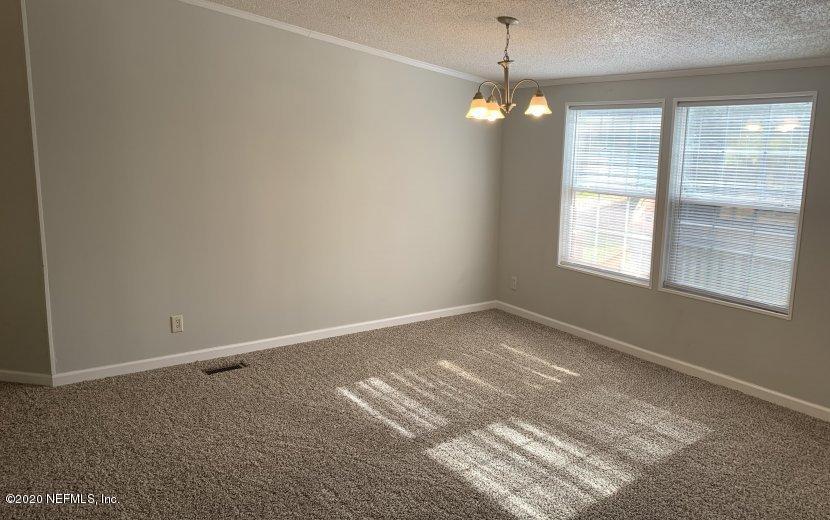 3980 Pinto Road Middleburg, FL 32068 - Photo 13 of 24 a view of an empty room with a window
