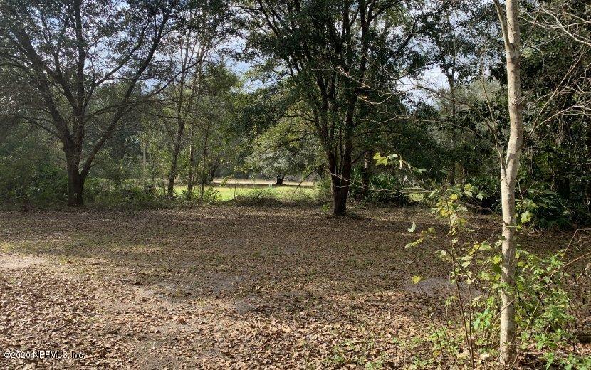 3980 Pinto Road Middleburg, FL 32068 - Photo 18 of 24 a view of outdoor space with trees