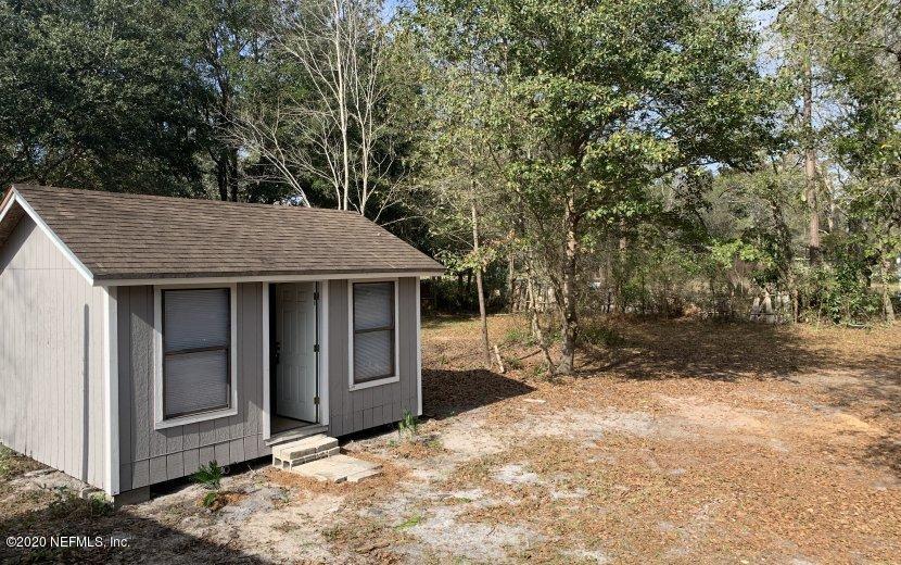 3980 Pinto Road Middleburg, FL 32068 - Photo 19 of 24 a backyard of a house