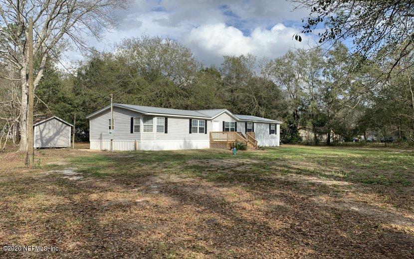 3980 Pinto Road Middleburg, FL 32068 - Photo 20 of 24 a view of a house with a yard