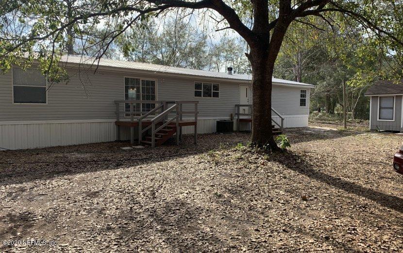 3980 Pinto Road Middleburg, FL 32068 - Photo 21 of 24 a house view with a backyard space