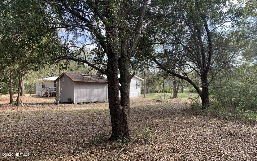 3980 Pinto Road Middleburg, FL 32068 - Photo 23 of 24 a tree in the middle of a yard