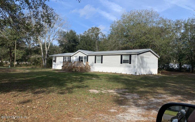 3980 Pinto Road Middleburg, FL 32068 - Photo 3 of 24 a view of a house with a yard