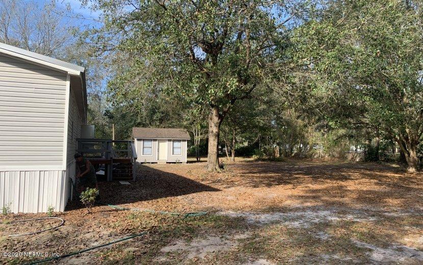 3980 Pinto Road Middleburg, FL 32068 - Photo 10 of 24 a view of a house with a yard
