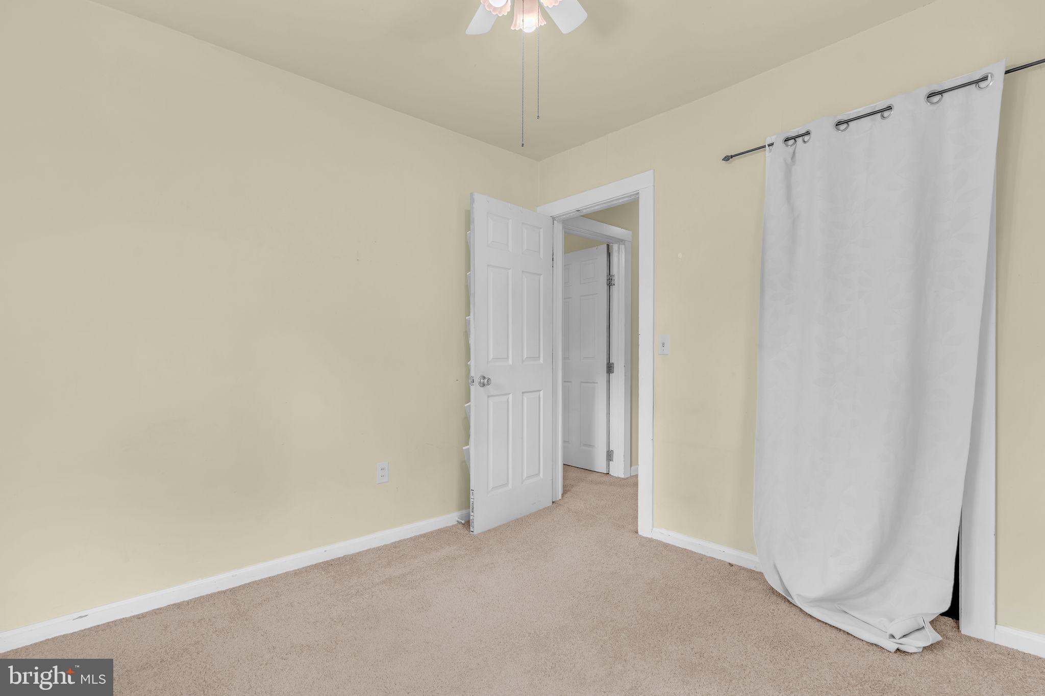 2159 Mathias Point Road King George, VA 22485 - Photo 12 of 22 a view of a room with an entryway and chandelier fan