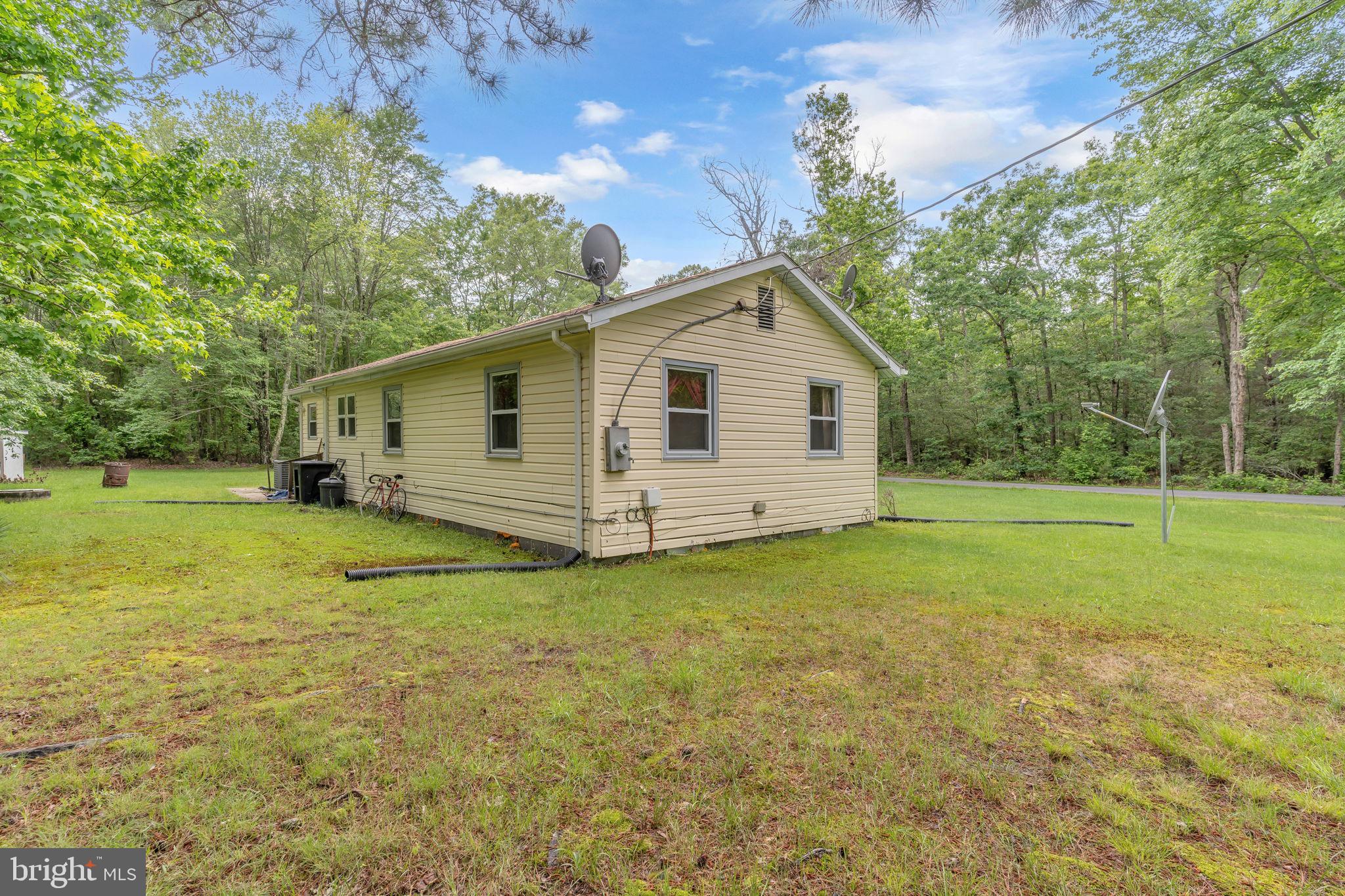 2159 Mathias Point Road King George, VA 22485 - Photo 18 of 22 a view of a house with backyard