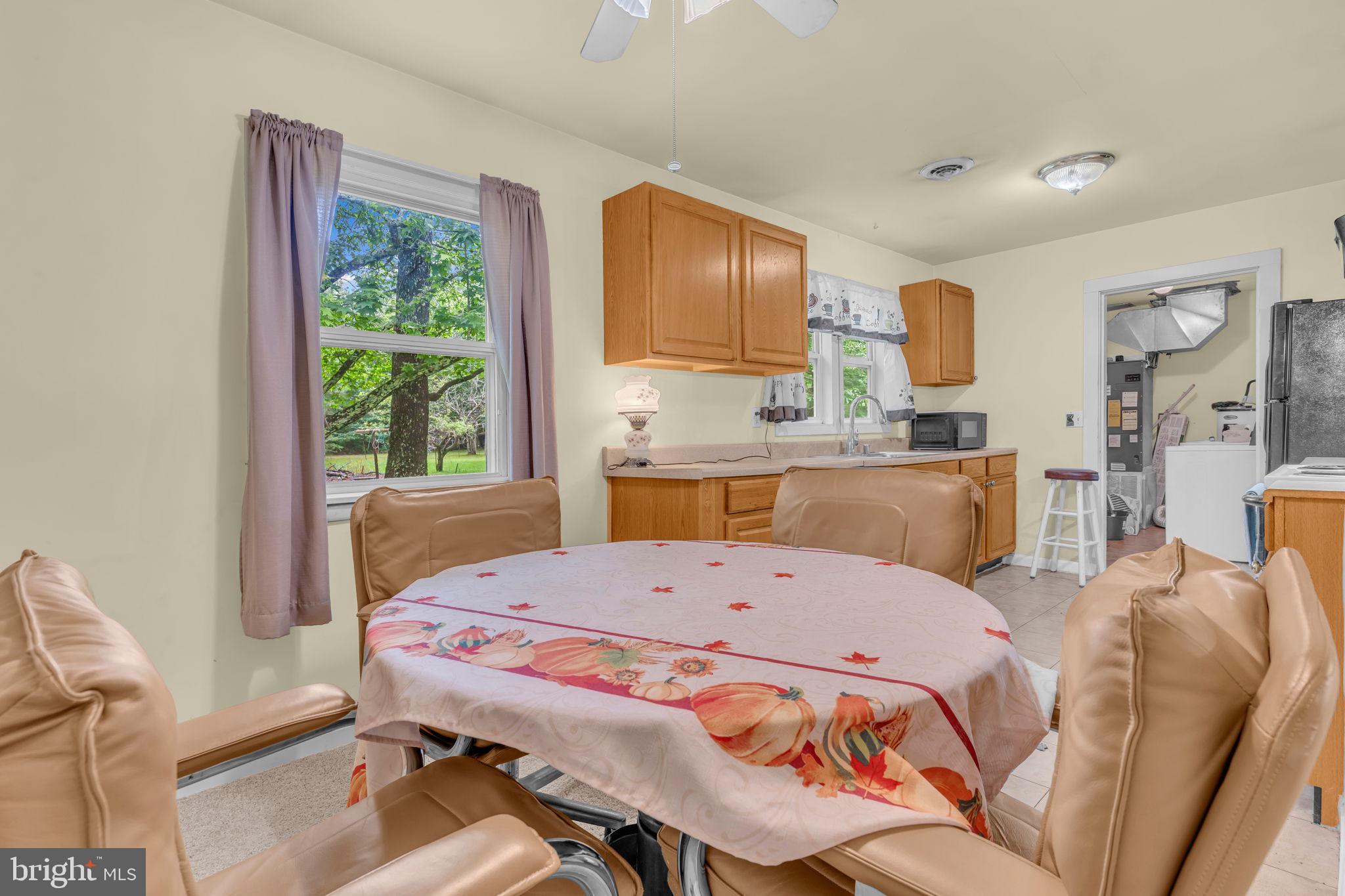 2159 Mathias Point Road King George, VA 22485 - Photo 7 of 22 a large bed sitting in a bedroom next to a window