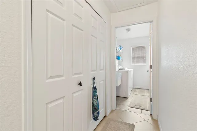 a bathroom with white walls