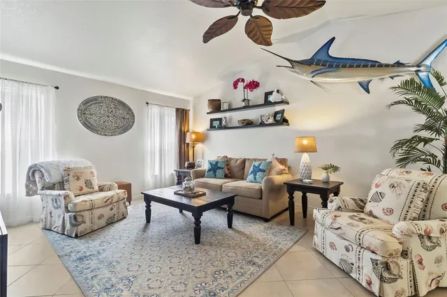 a living room with furniture and a rug