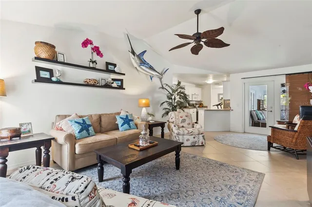 a living room with furniture and a rug