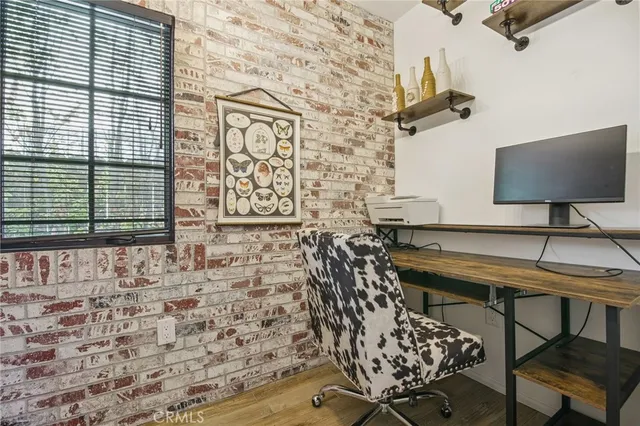 a balcony with table and chairs