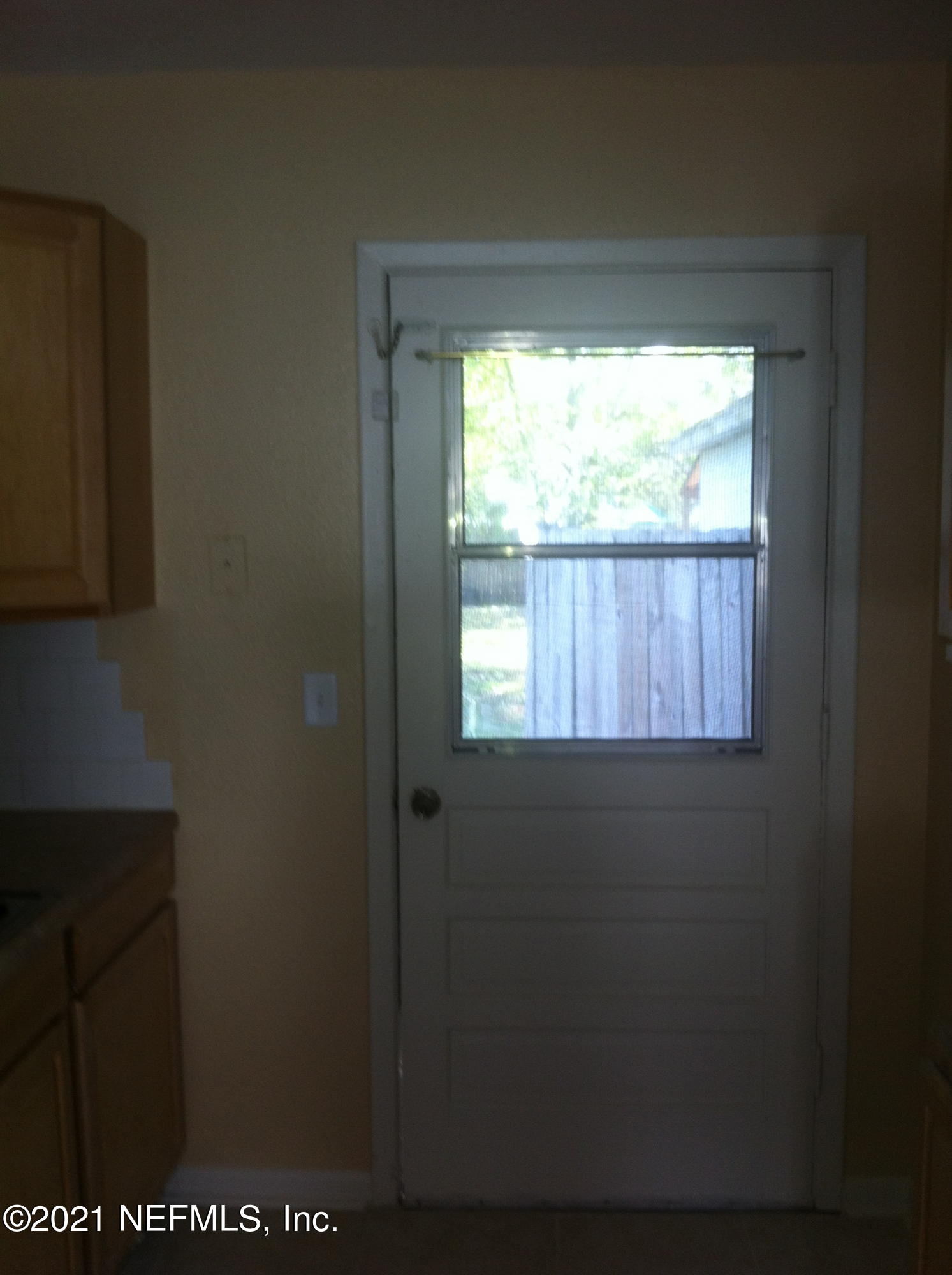 698 Kestner Road Atlantic Beach, FL 32233 - Photo 4 of 8 a view of a door and wooden floor