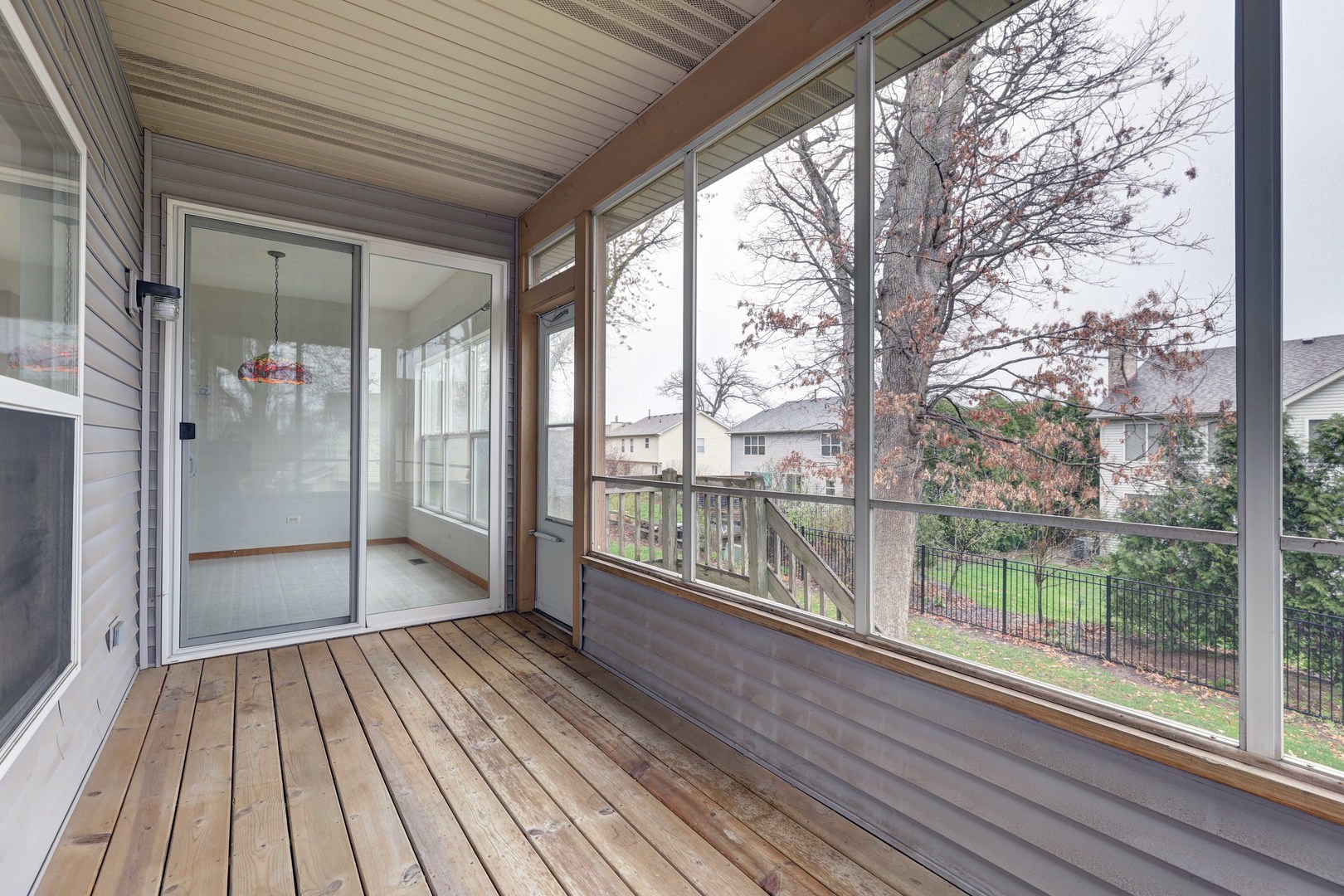 3206 Chestnut Drive McHenry, IL 60051 - Photo 14 of 30 a view of a balcony with wooden floor