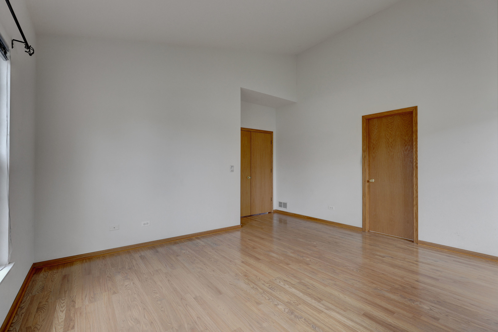 3206 Chestnut Drive McHenry, IL 60051 - Photo 16 of 30 a view of an empty room with wooden floor and closet