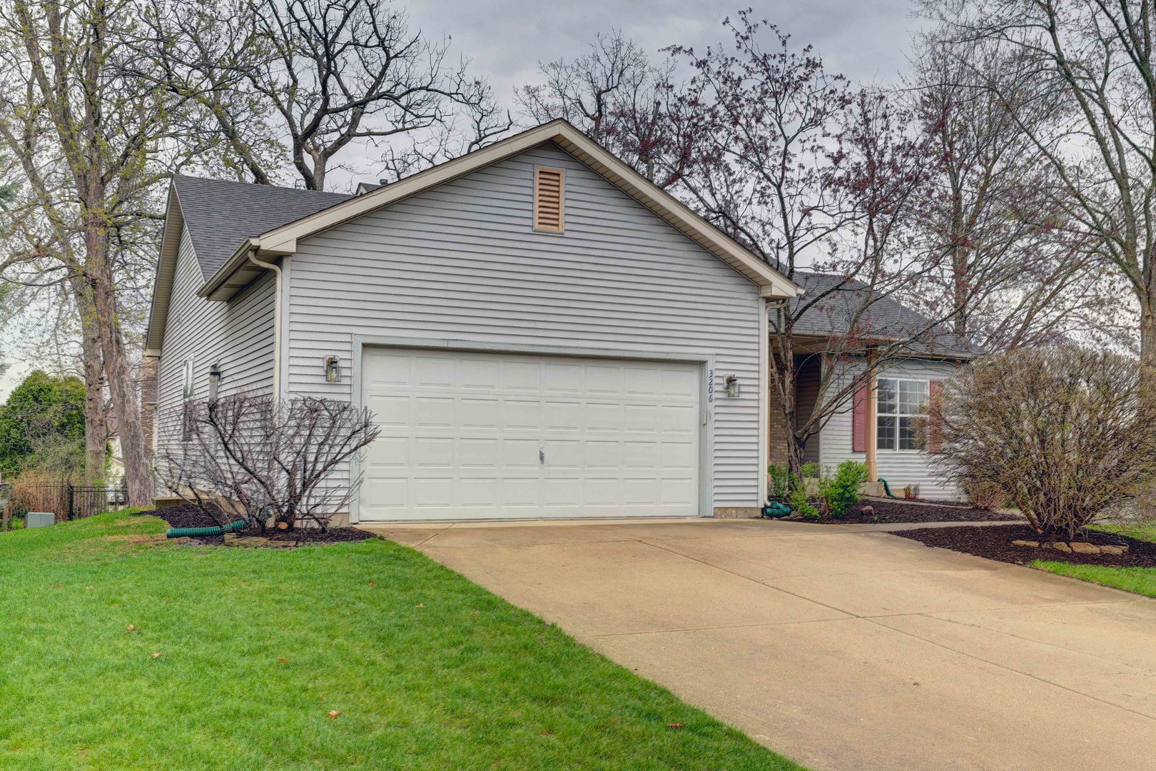 3206 Chestnut Drive McHenry, IL 60051 - Photo 2 of 30 a front view of a house with garden
