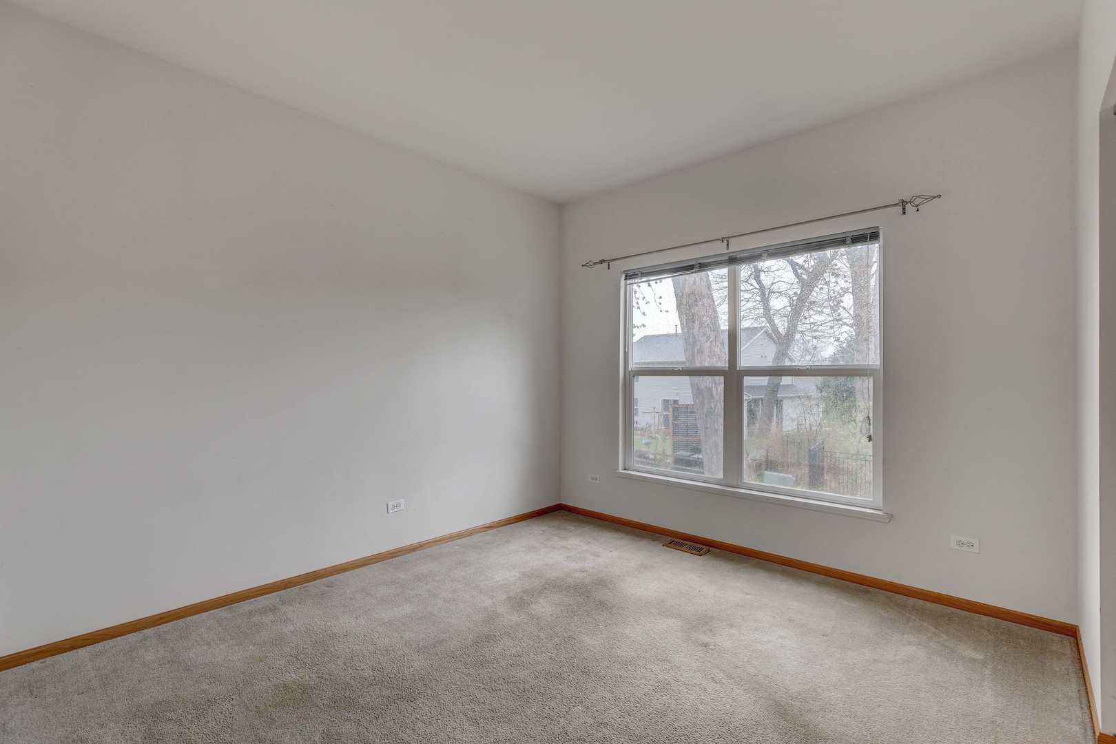 3206 Chestnut Drive McHenry, IL 60051 - Photo 22 of 30 an empty room with windows