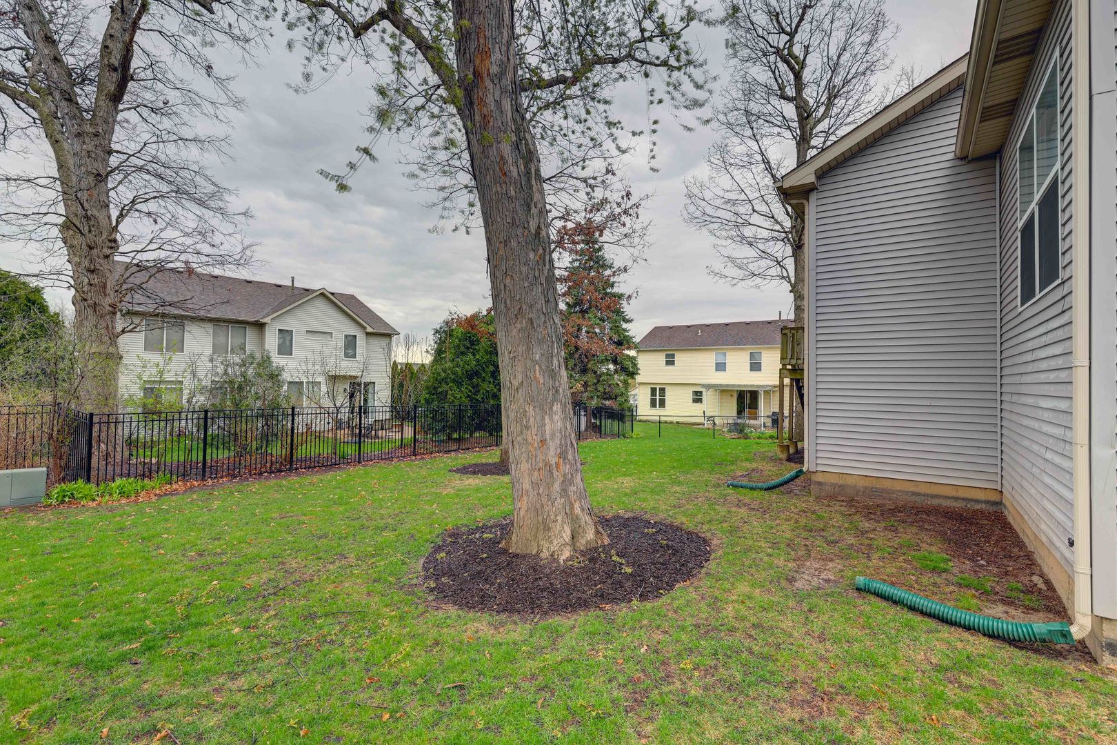 3206 Chestnut Drive McHenry, IL 60051 - Photo 28 of 30 a view of a house with a yard and tree s