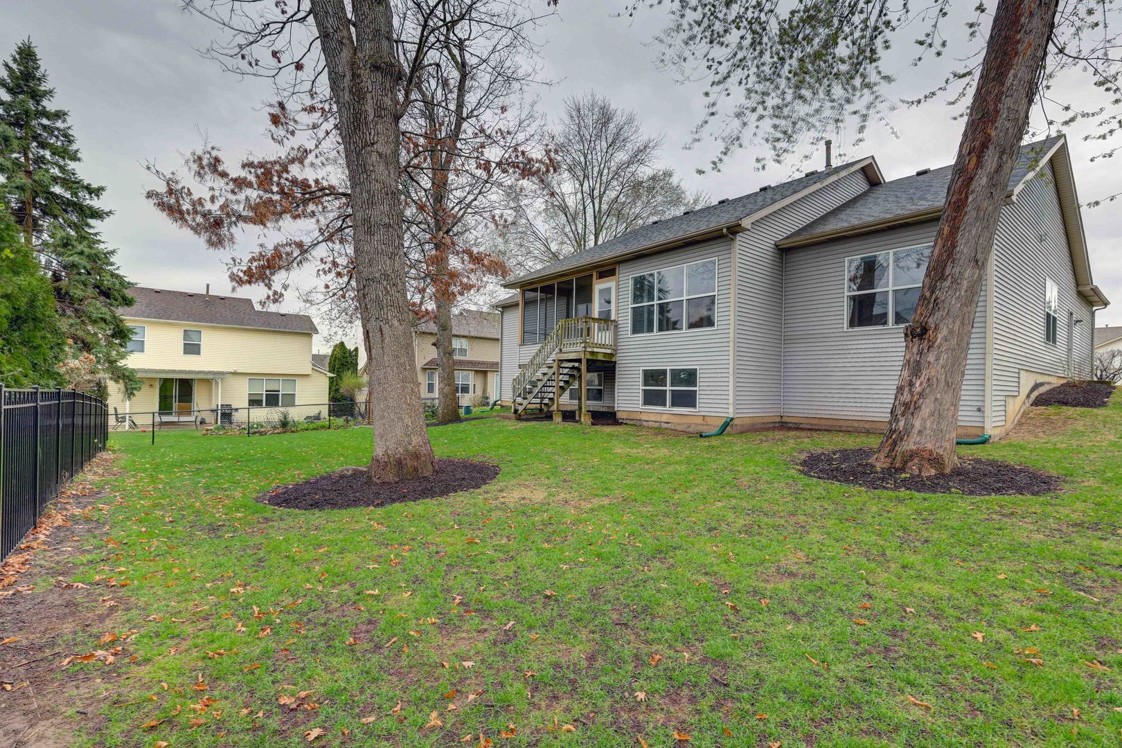 3206 Chestnut Drive McHenry, IL 60051 - Photo 29 of 30 a view of a house with a yard