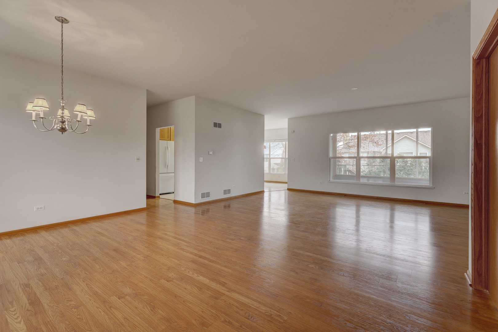 3206 Chestnut Drive McHenry, IL 60051 - Photo 5 of 30 a view of livingroom with hardwood floor and window