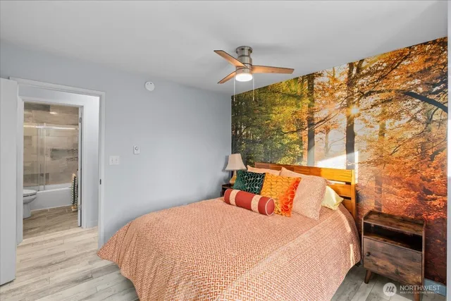 a view of kitchen with furniture and refrigerator