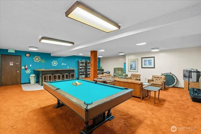 a living room with furniture and a table