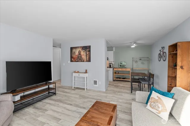 a view of a balcony with a couple of chairs