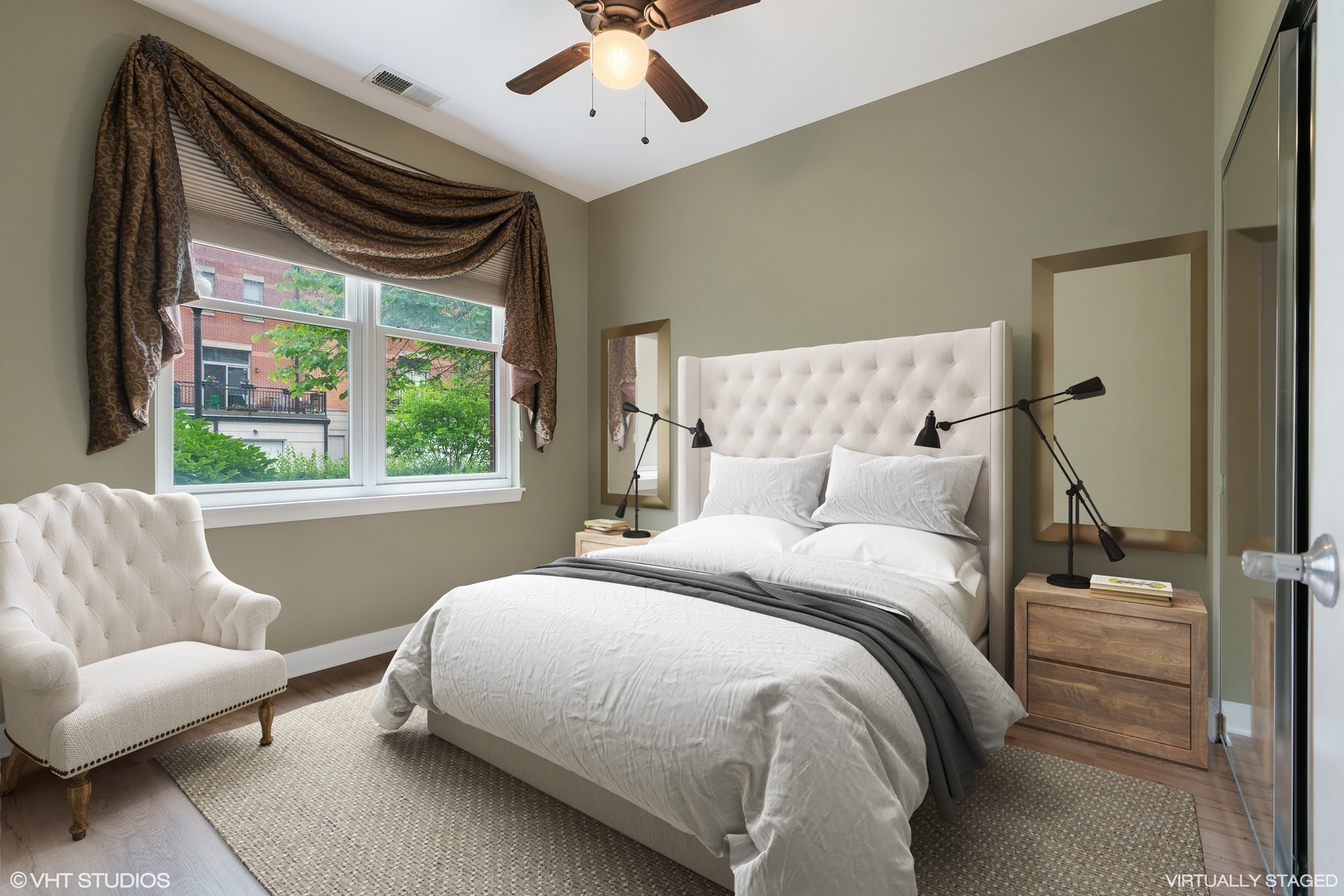 1509 South Halsted Street, Unit 211 Chicago, IL 60607 - Photo 9 of 13 a bedroom with a bed and a large window