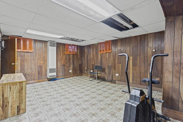 a large bedroom with bed and furniture