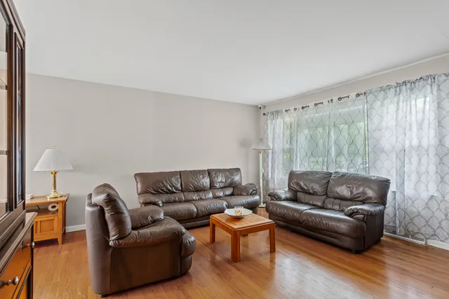 a living room with furniture and a couch